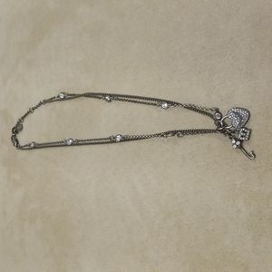 Juicy Couture onyxed silver plated charm double strand necklace. Worn once.